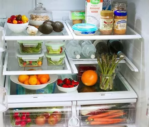 صور - كيف يمكن ان تساعد الثلاجة في انقاص الوزن ؟