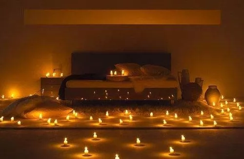 صور - كيف يمكن تزيين غرف النوم بالشموع ؟