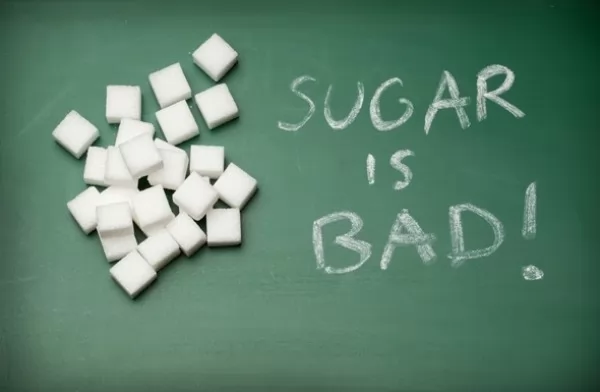 صور - تعرف على 10 من اضرار السكر على صحتك